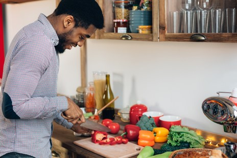 Man slicing veggies a man cutting vegetables